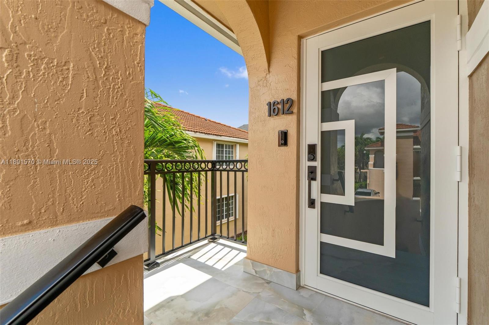 13160 Southwest 64th Terrace, Unit 1612 Miami, FL 33183 - Photo 1 of 32 a view of a balcony