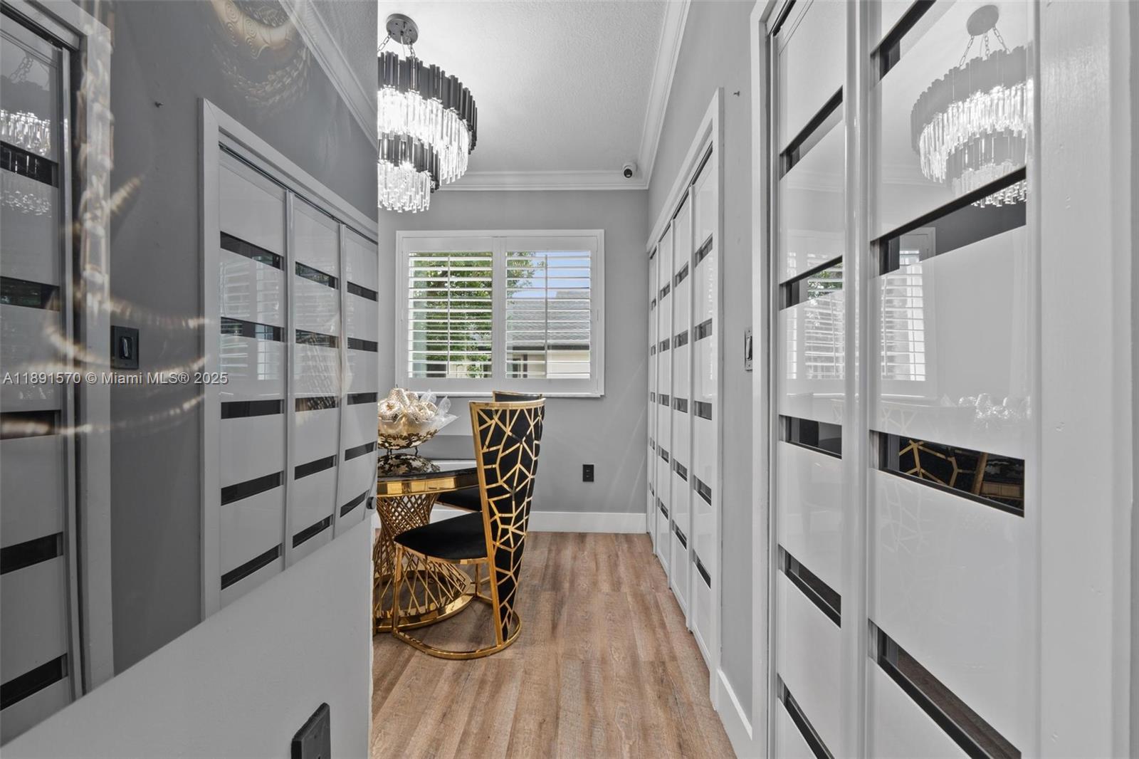 13160 Southwest 64th Terrace, Unit 1612 Miami, FL 33183 - Photo 11 of 32 a view of a room with furniture and wooden floor