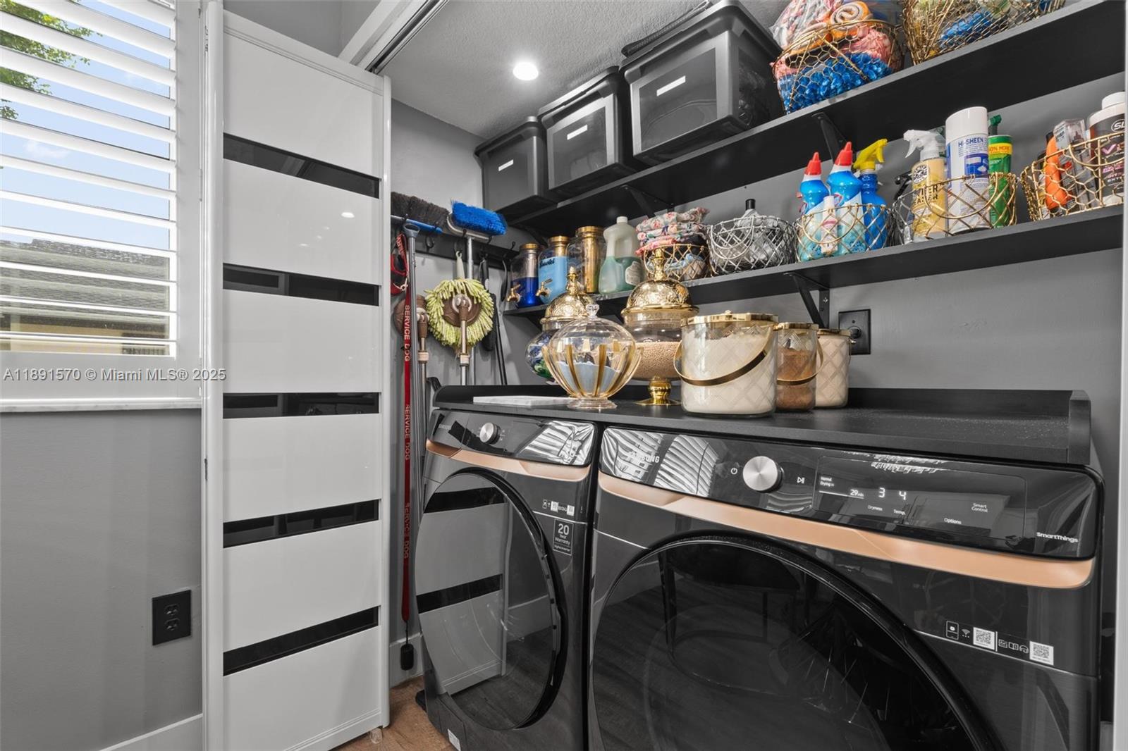13160 Southwest 64th Terrace, Unit 1612 Miami, FL 33183 - Photo 12 of 32 a kitchen with a stove and cabinets