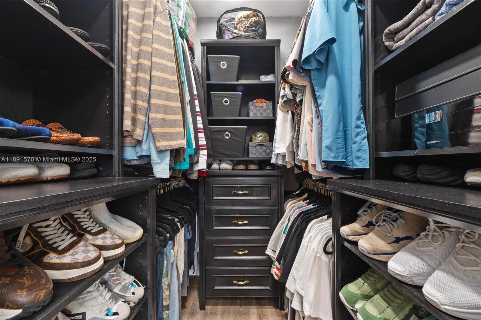 13160 Southwest 64th Terrace, Unit 1612 Miami, FL 33183 - Photo 16 of 32 a close view of shoes and a fireplace