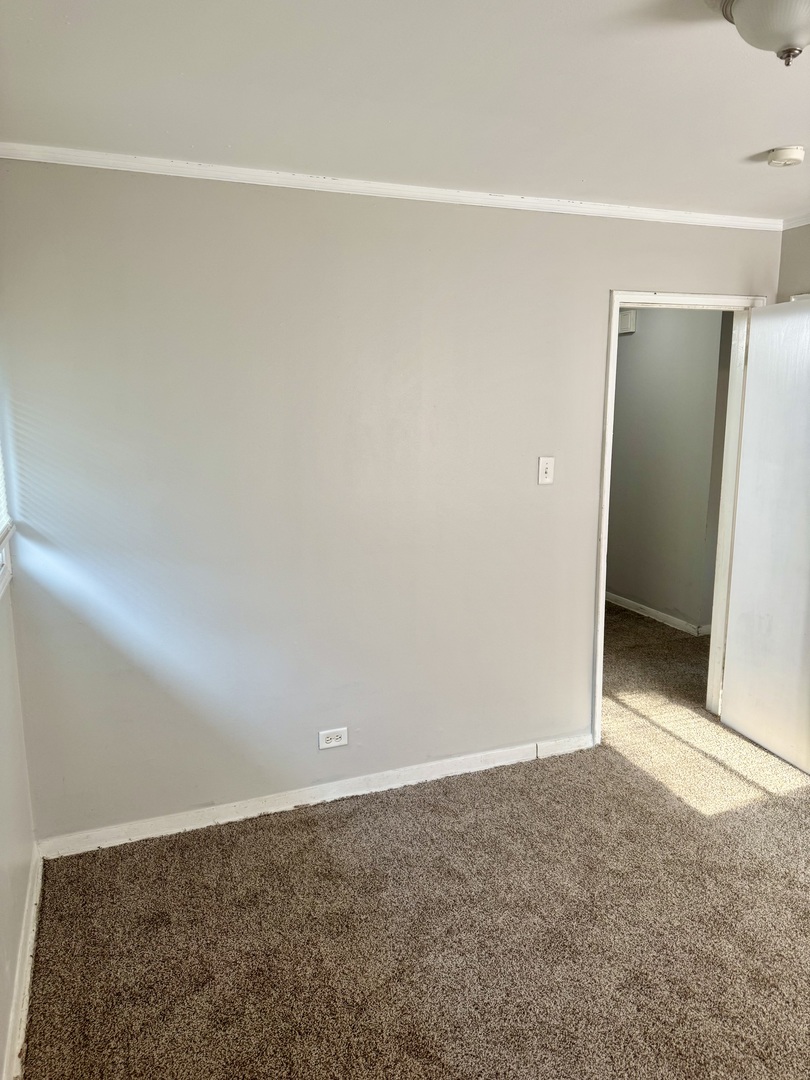 1212 East 151st Street Dolton, IL 60419 - Photo 16 of 24 a view of an empty room