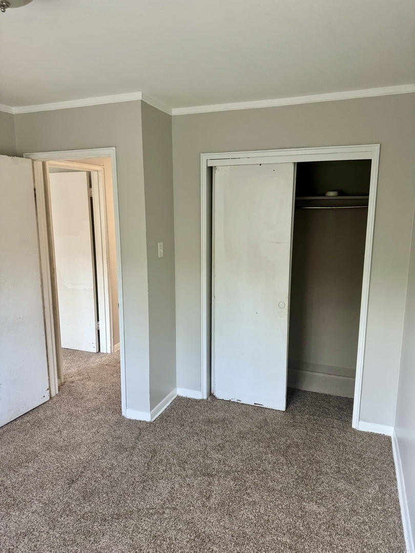 1212 East 151st Street Dolton, IL 60419 - Photo 18 of 24 a view of an empty room and closet area