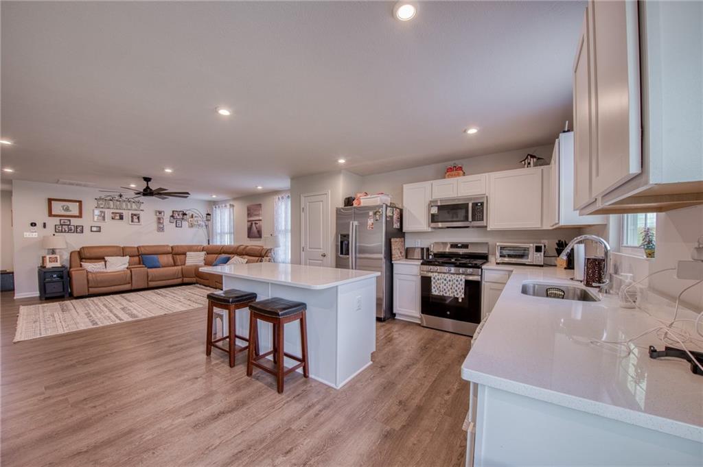113 Dominic Drive Butler, PA 16001 - Photo 11 of 45 a large white kitchen with lots of counter space a sink and appliances