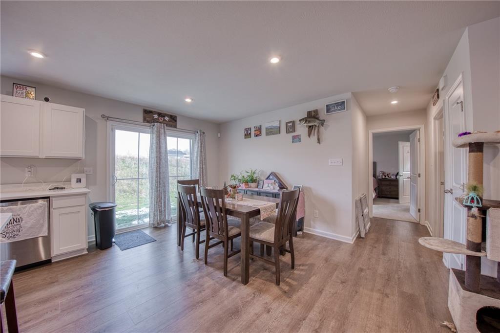113 Dominic Drive Butler, PA 16001 - Photo 14 of 45 a view of a dining room with furniture and wooden floor
