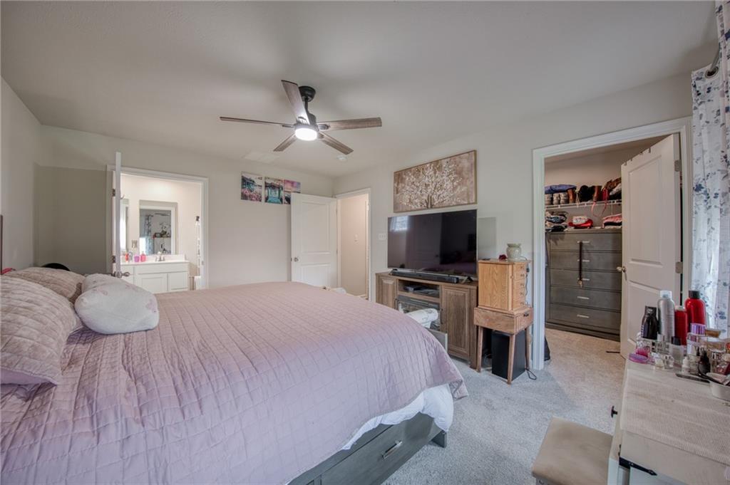 113 Dominic Drive Butler, PA 16001 - Photo 24 of 45 a bedroom with a bed and a flat screen tv