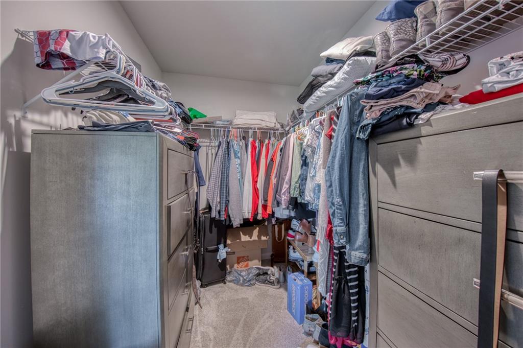 113 Dominic Drive Butler, PA 16001 - Photo 26 of 45 a view of walk in closet with clothes and shoes