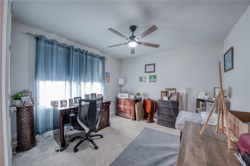 113 Dominic Drive Butler, PA 16001 - Photo 29 of 45 a view of a workspace with furniture and a window