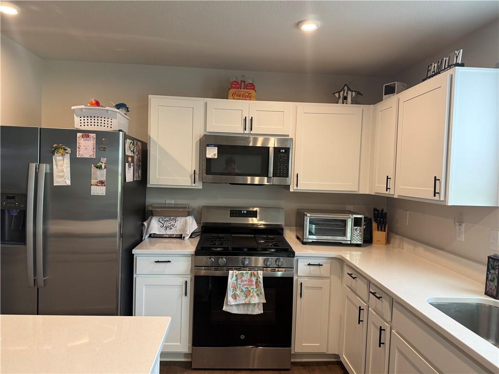113 Dominic Drive Butler, PA 16001 - Photo 45 of 45 a kitchen with stainless steel appliances granite countertop a refrigerator and a stove