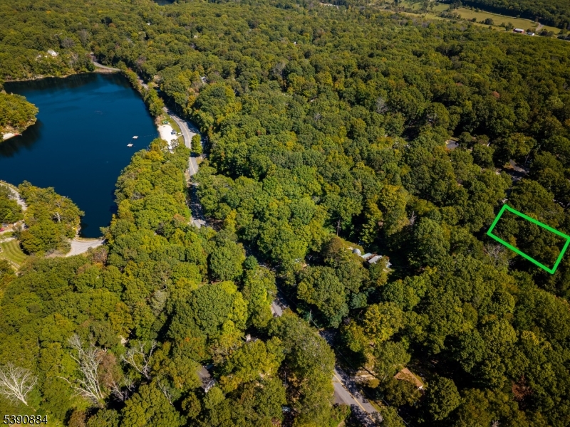 6 Ridge Road Northwest Vernon, NJ 07461 - Photo 10 of 18 a view of a house with a tree