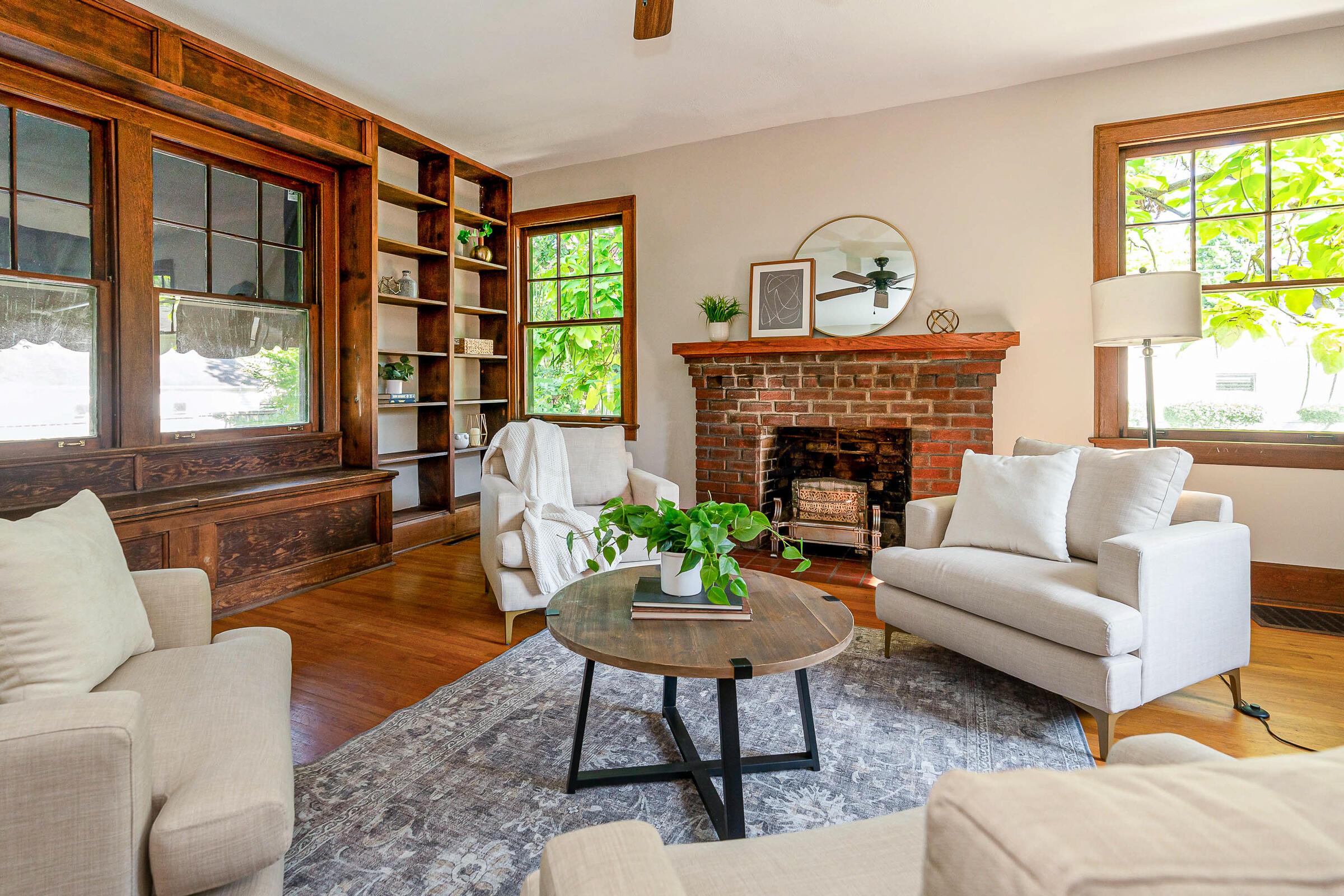 168 Fallis Road Columbus, OH 43214 - Photo 13 of 43 The library features a decorative fireplace with mantel and outstanding natural light