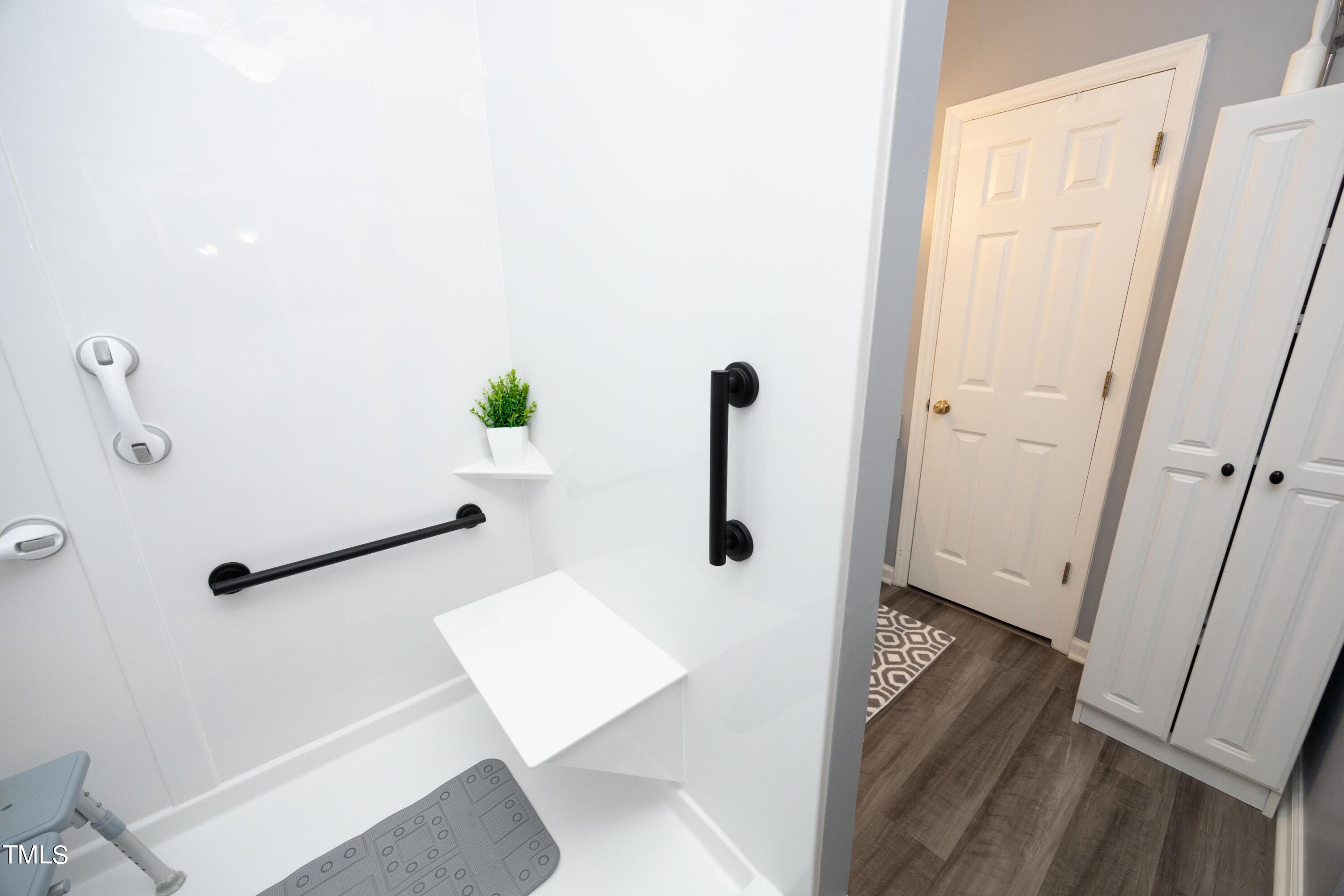 243 Bradley Drive Benson, NC 27504 - Photo 19 of 43 a view of a hallway with closet