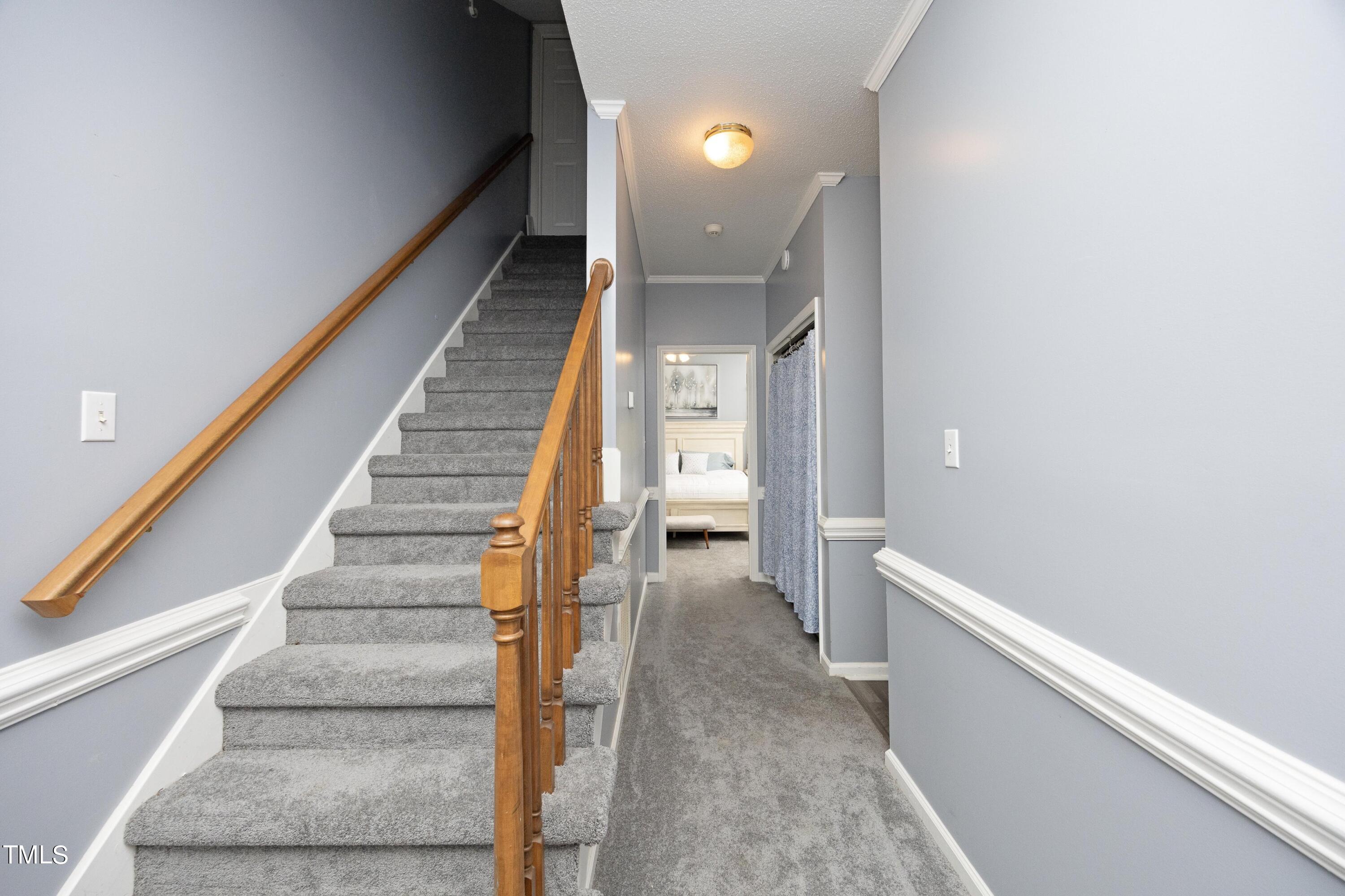 243 Bradley Drive Benson, NC 27504 - Photo 25 of 43 a view of entryway and hall with wooden floor