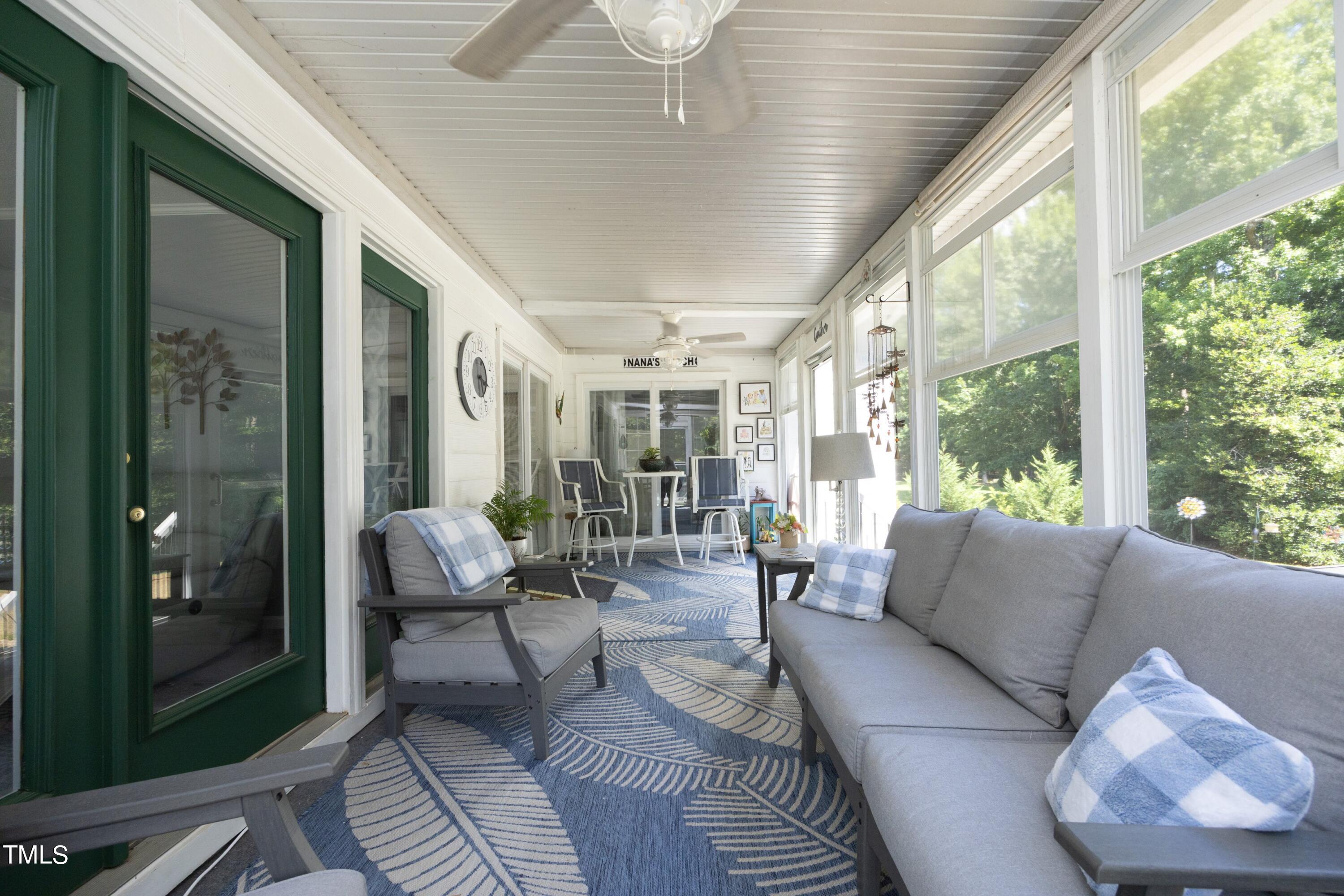 243 Bradley Drive Benson, NC 27504 - Photo 8 of 43 a living room with furniture and a large window