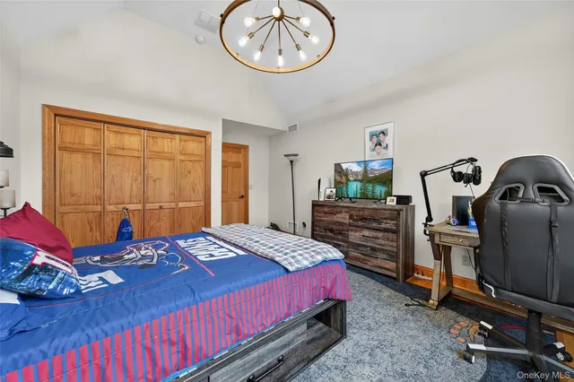 a balcony with furniture and wooden floor