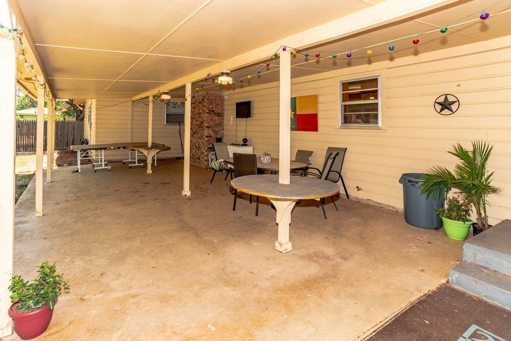 3706 41st Street Lubbock, TX 79413 - Photo 16 of 20 a view of a chairs and table in the patio