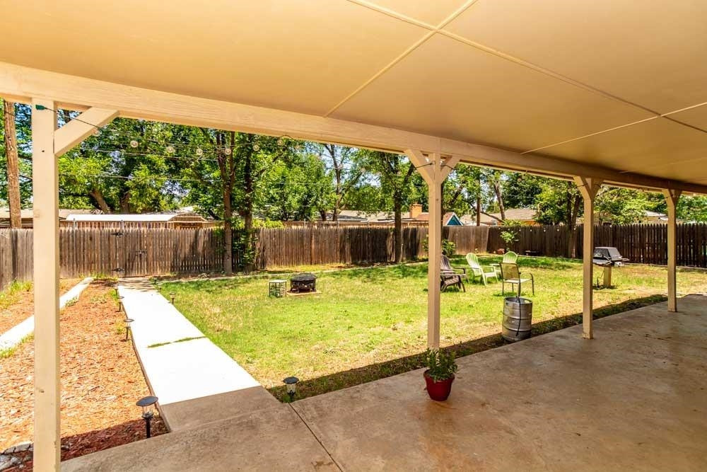 3706 41st Street Lubbock, TX 79413 - Photo 18 of 20 a swimming pool with some view of the back yard