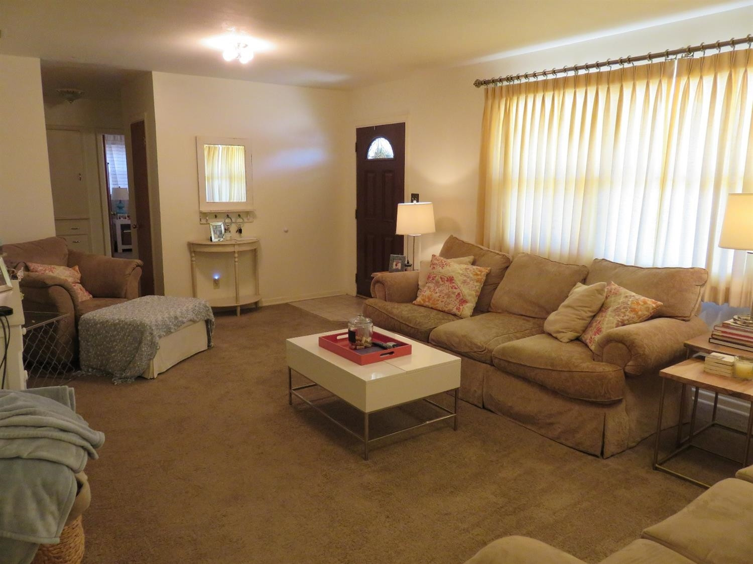 3706 41st Street Lubbock, TX 79413 - Photo 3 of 20 a living room with furniture and a large window