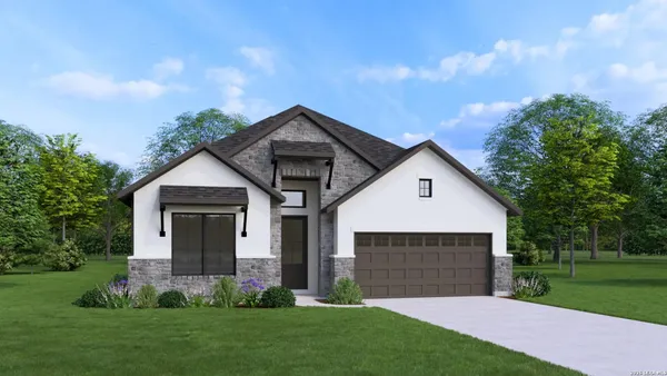 a front view of house with yard and green space