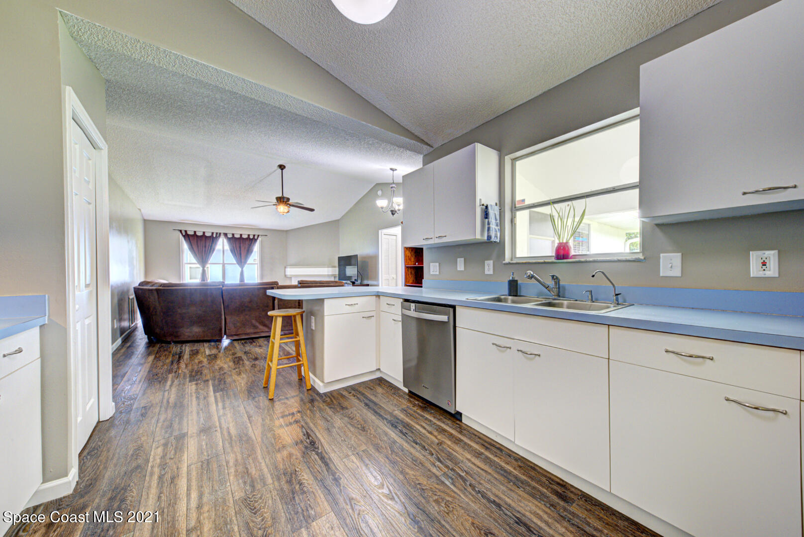279 Rheine Road Northwest Palm Bay, FL 32907 - Photo 12 of 35 kitchen open to family room