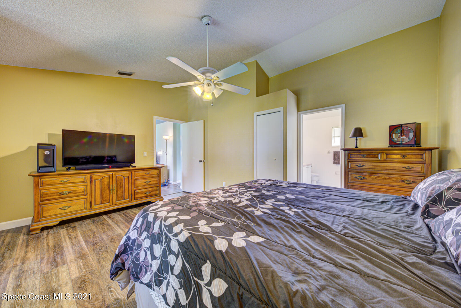279 Rheine Road Northwest Palm Bay, FL 32907 - Photo 19 of 35 master bedroom with ensuite