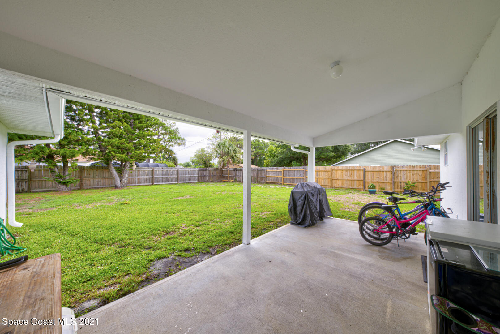 279 Rheine Road Northwest Palm Bay, FL 32907 - Photo 31 of 35 covered back patio