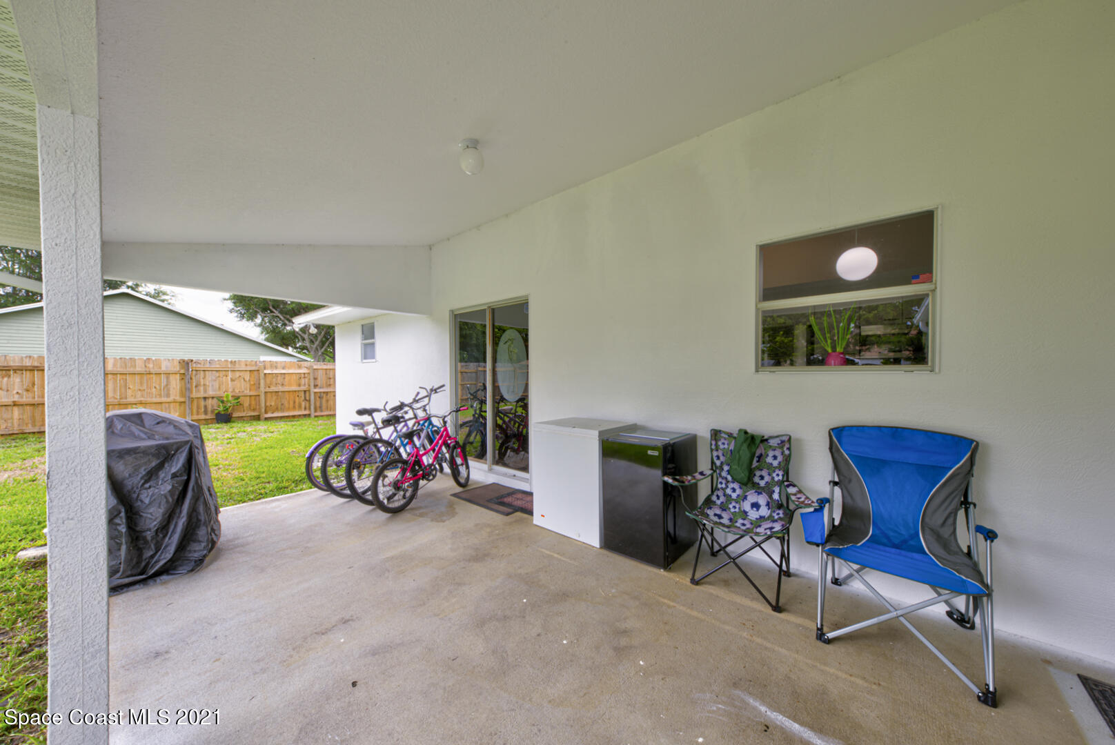 279 Rheine Road Northwest Palm Bay, FL 32907 - Photo 32 of 35 covered patio