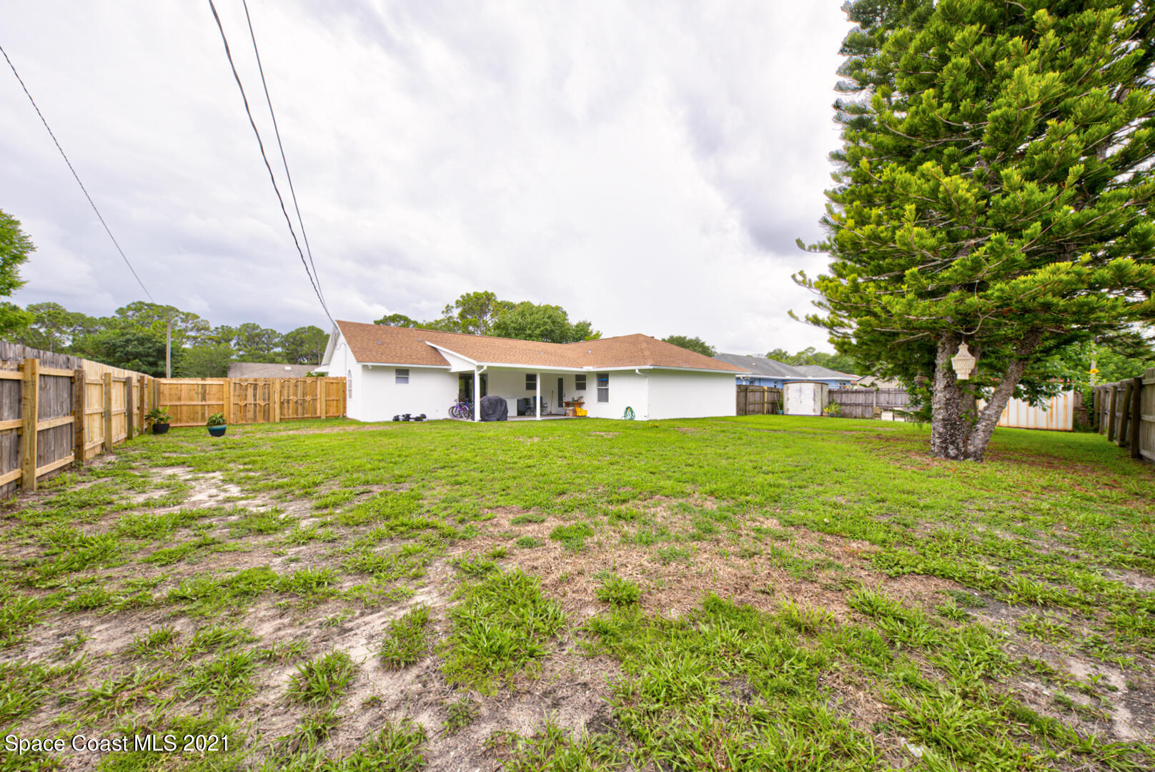 279 Rheine Road Northwest Palm Bay, FL 32907 - Photo 33 of 35 back of house left