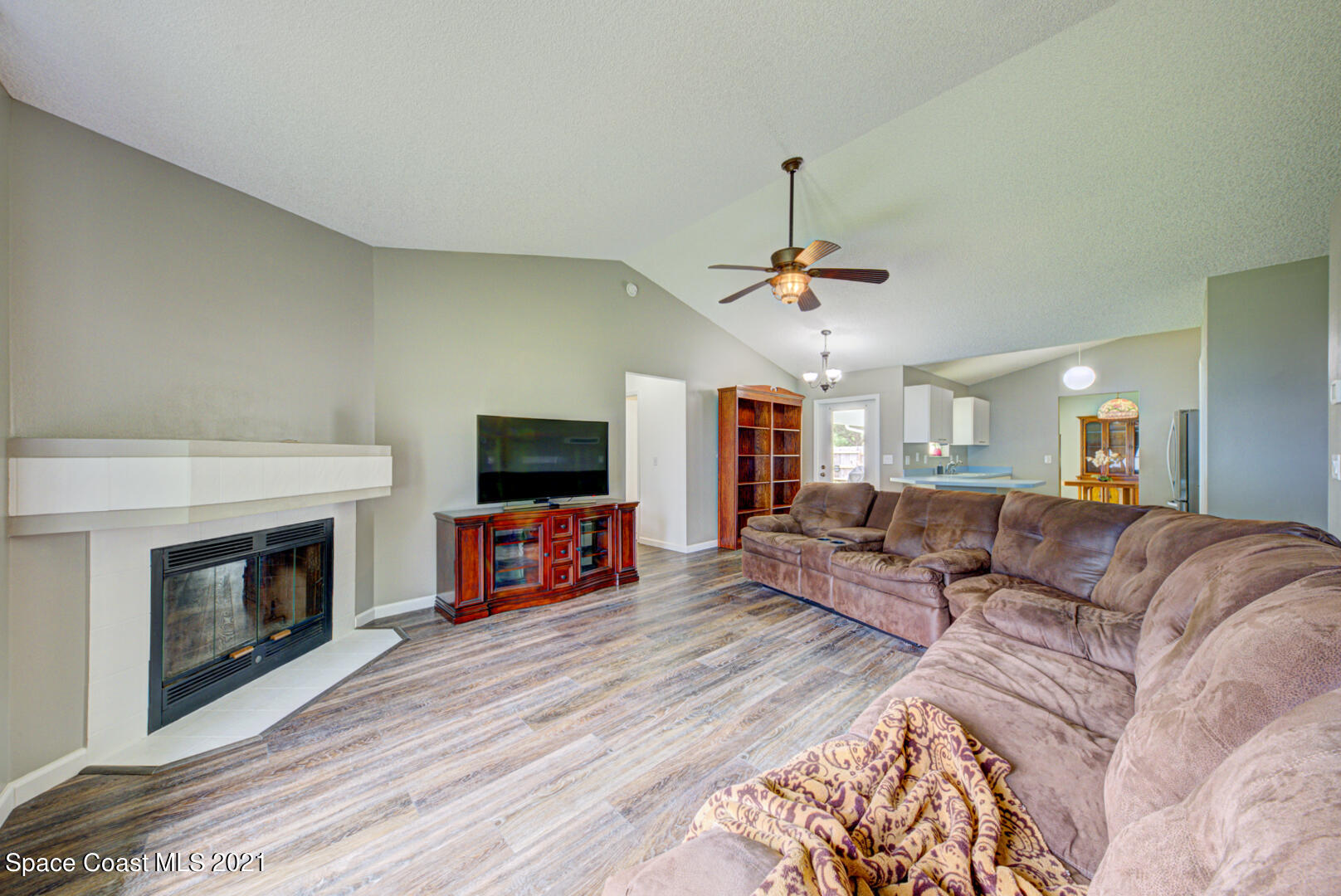 279 Rheine Road Northwest Palm Bay, FL 32907 - Photo 6 of 35 family room with fireplace