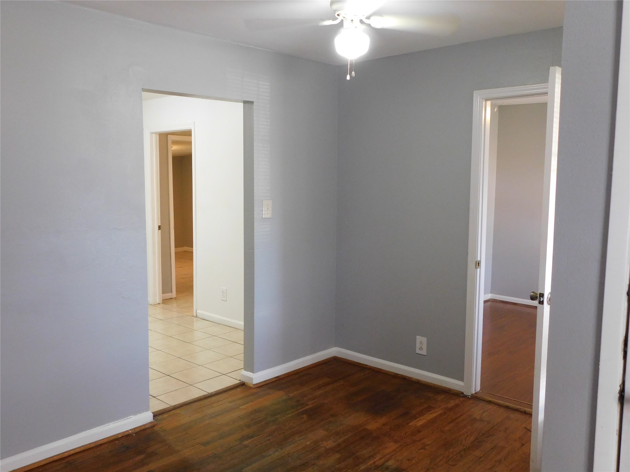 3934 Cosby Street Houston, TX 77021 - Photo 3 of 10 an empty room with wooden floor and closet