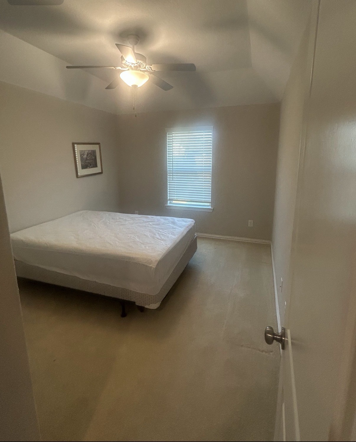2136 Moss Creek Lane Conroe, TX 77304 - Photo 18 of 23 a bedroom with a bed and a window