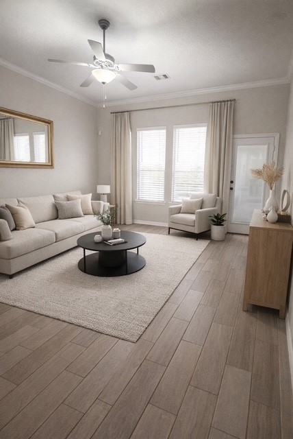 2136 Moss Creek Lane Conroe, TX 77304 - Photo 5 of 23 a living room with furniture and a large window