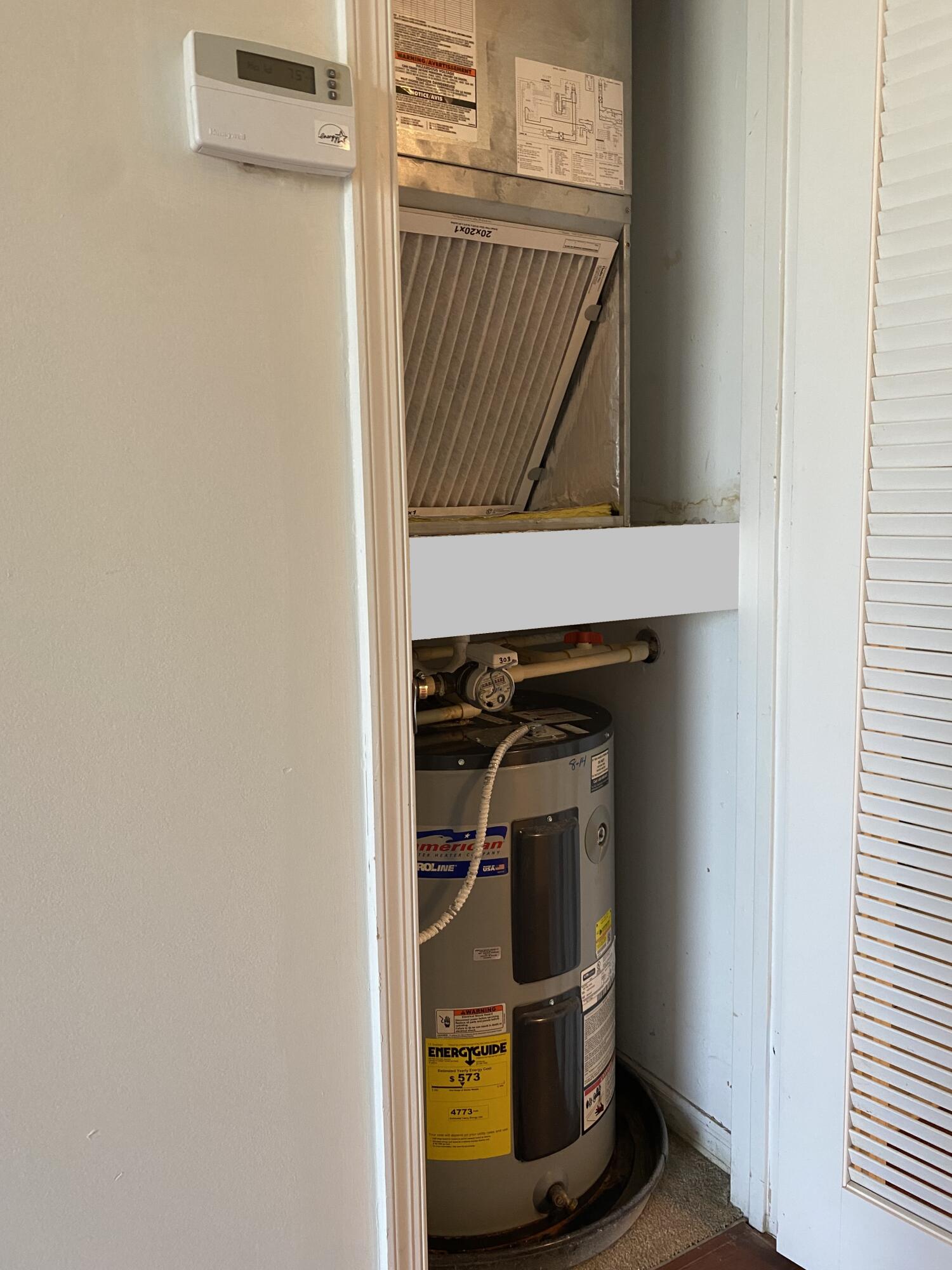 1155 Main Street, Unit 303 Jupiter, FL 33458 - Photo 21 of 25 A/C and water heater