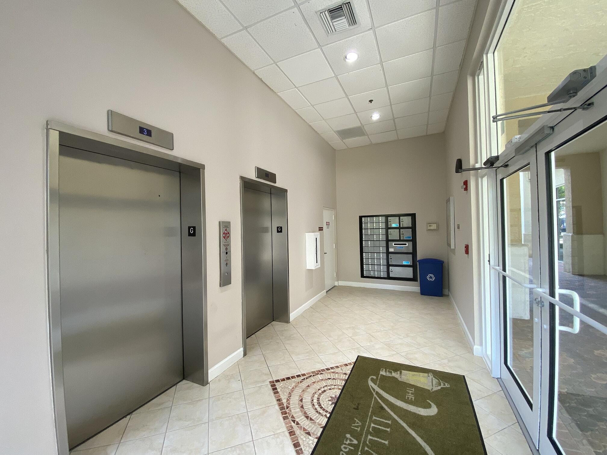 1155 Main Street, Unit 303 Jupiter, FL 33458 - Photo 3 of 25 Foyer