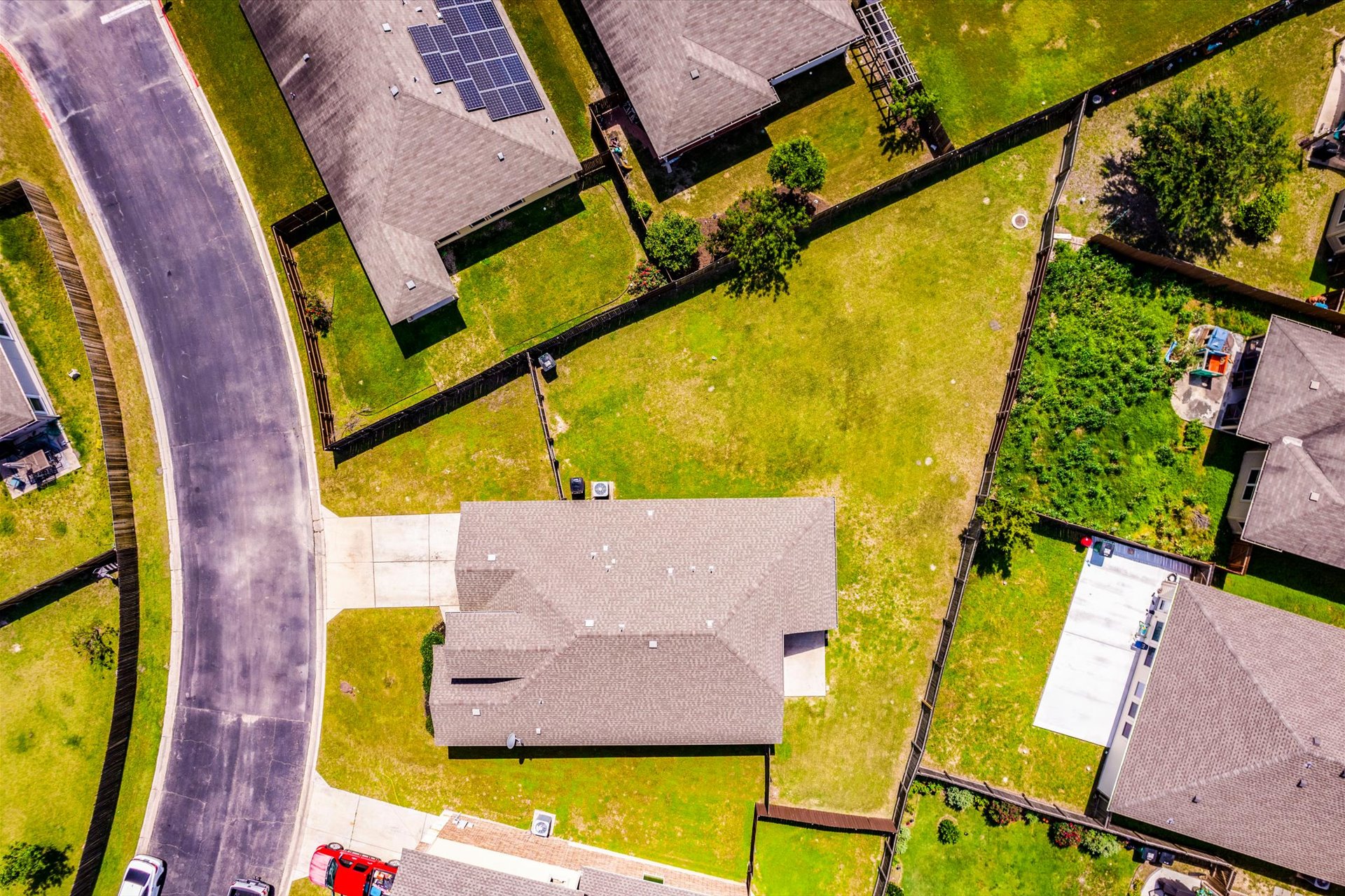 16829 Ruggio Road Pflugerville, TX 78660 - Photo 25 of 40 an aerial view of a residential apartment building with swimming pool