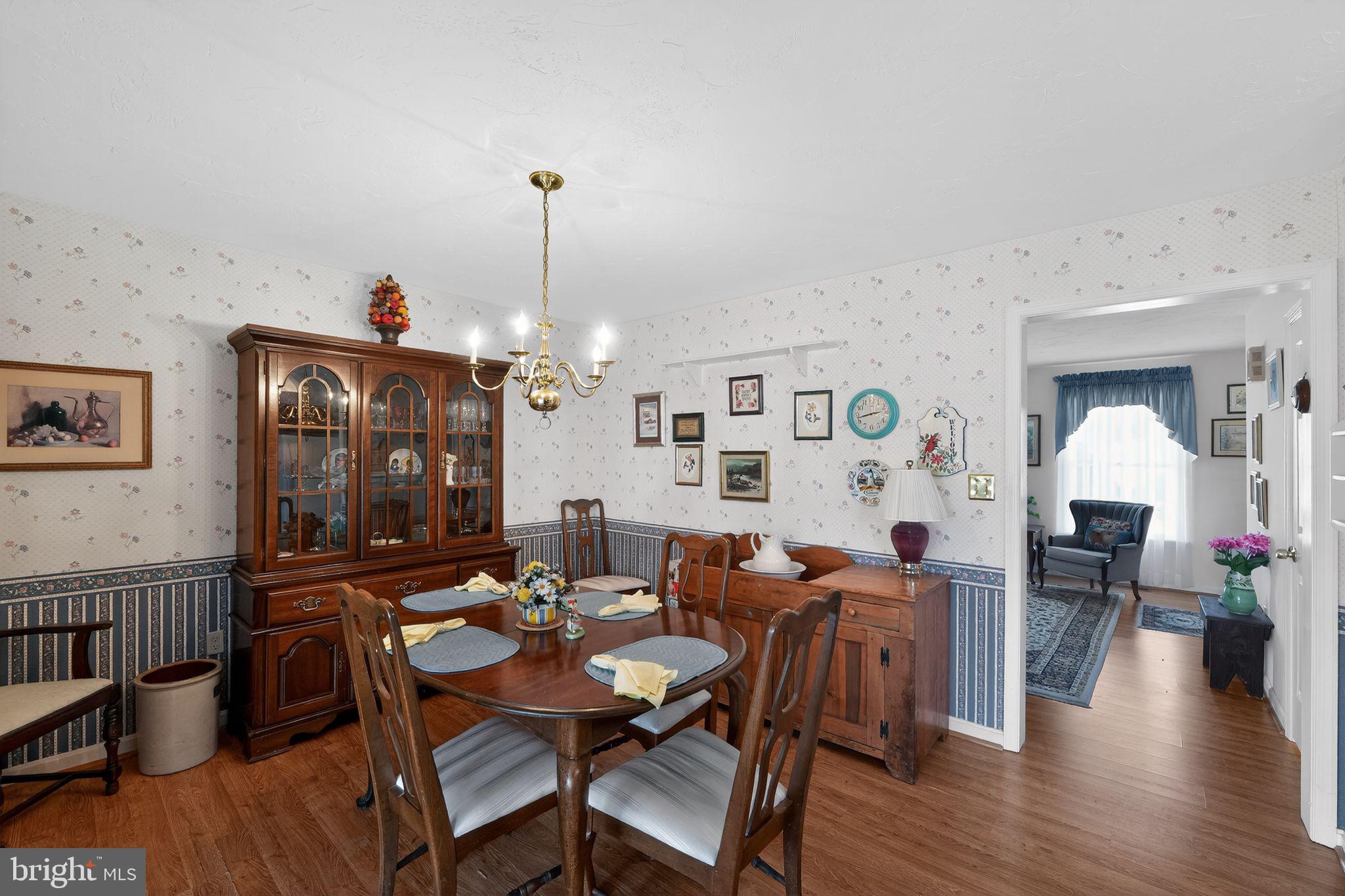23 Crescent Lane Littlestown, PA 17340 - Photo 16 of 30 a view of a dining room with furniture window and wooden floor