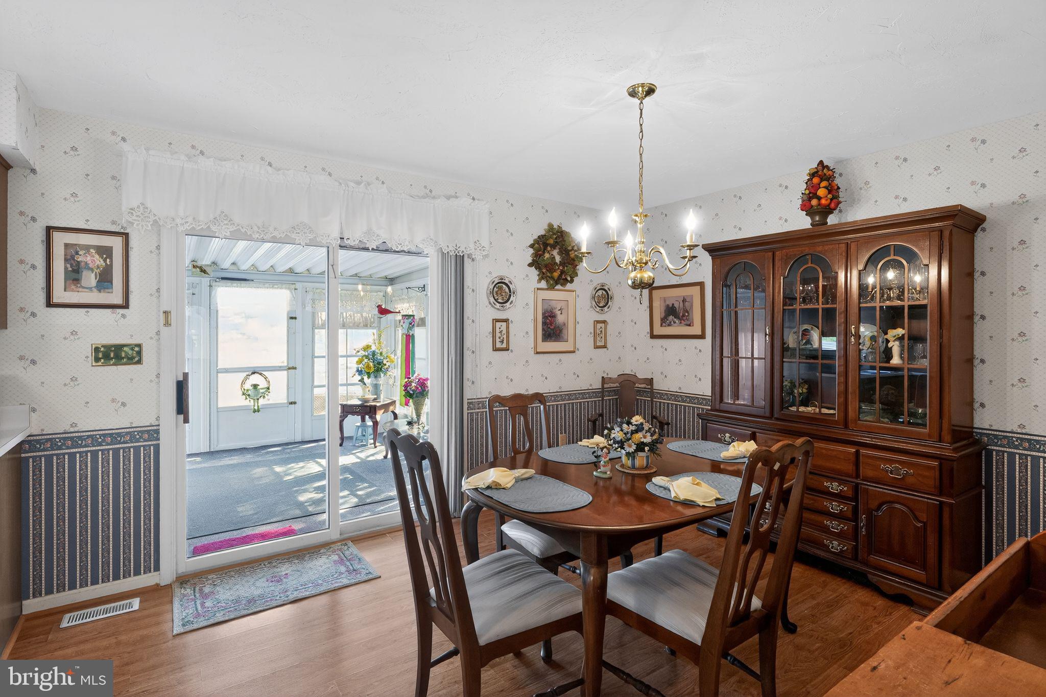 23 Crescent Lane Littlestown, PA 17340 - Photo 20 of 30 a view of a dining room with furniture and chandelier