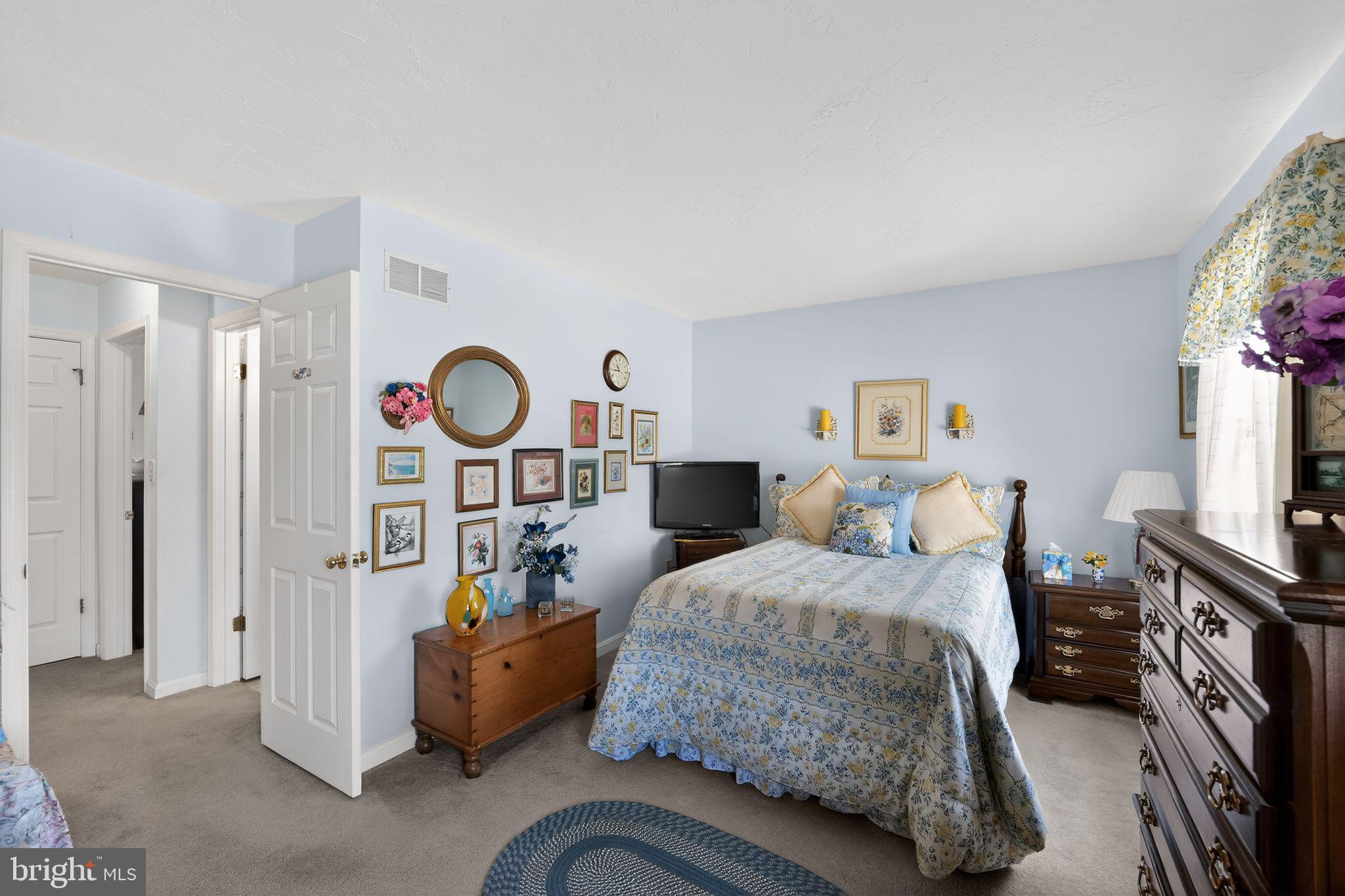 23 Crescent Lane Littlestown, PA 17340 - Photo 23 of 30 a bedroom with a bed and a flat screen television