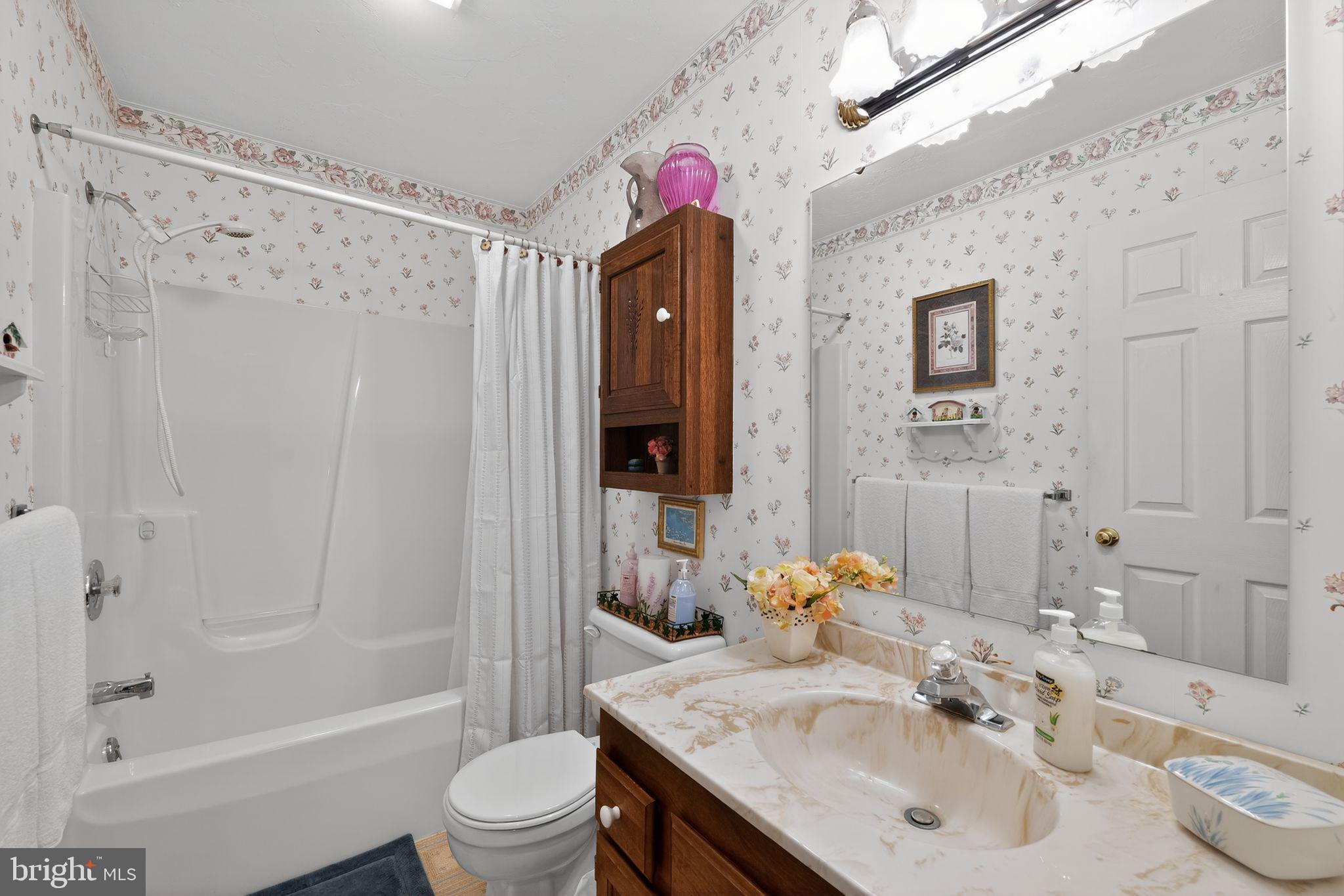 23 Crescent Lane Littlestown, PA 17340 - Photo 28 of 30 a bathroom with a sink toilet and shower