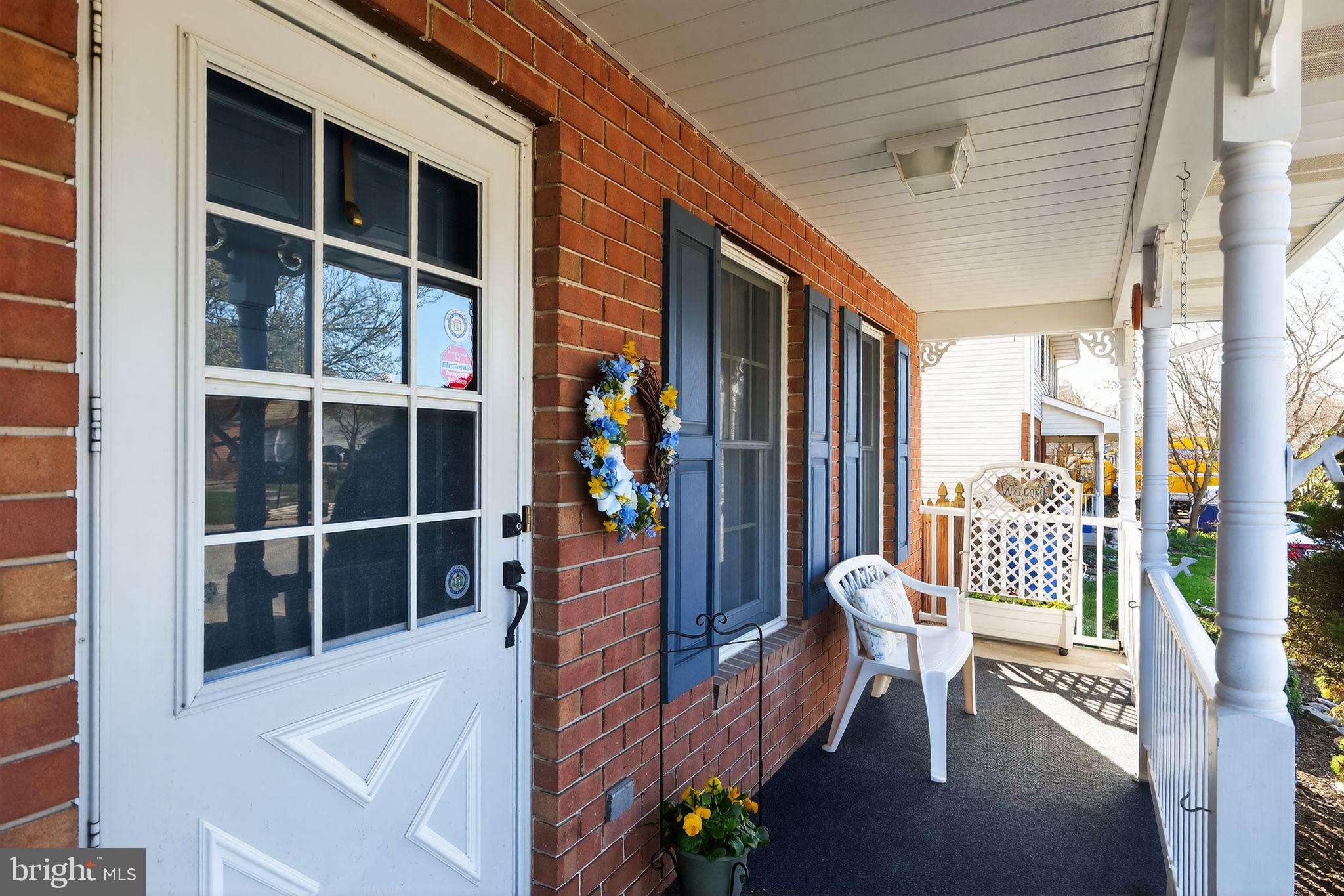 23 Crescent Lane Littlestown, PA 17340 - Photo 3 of 30 a balcony with furniture and a potted plant