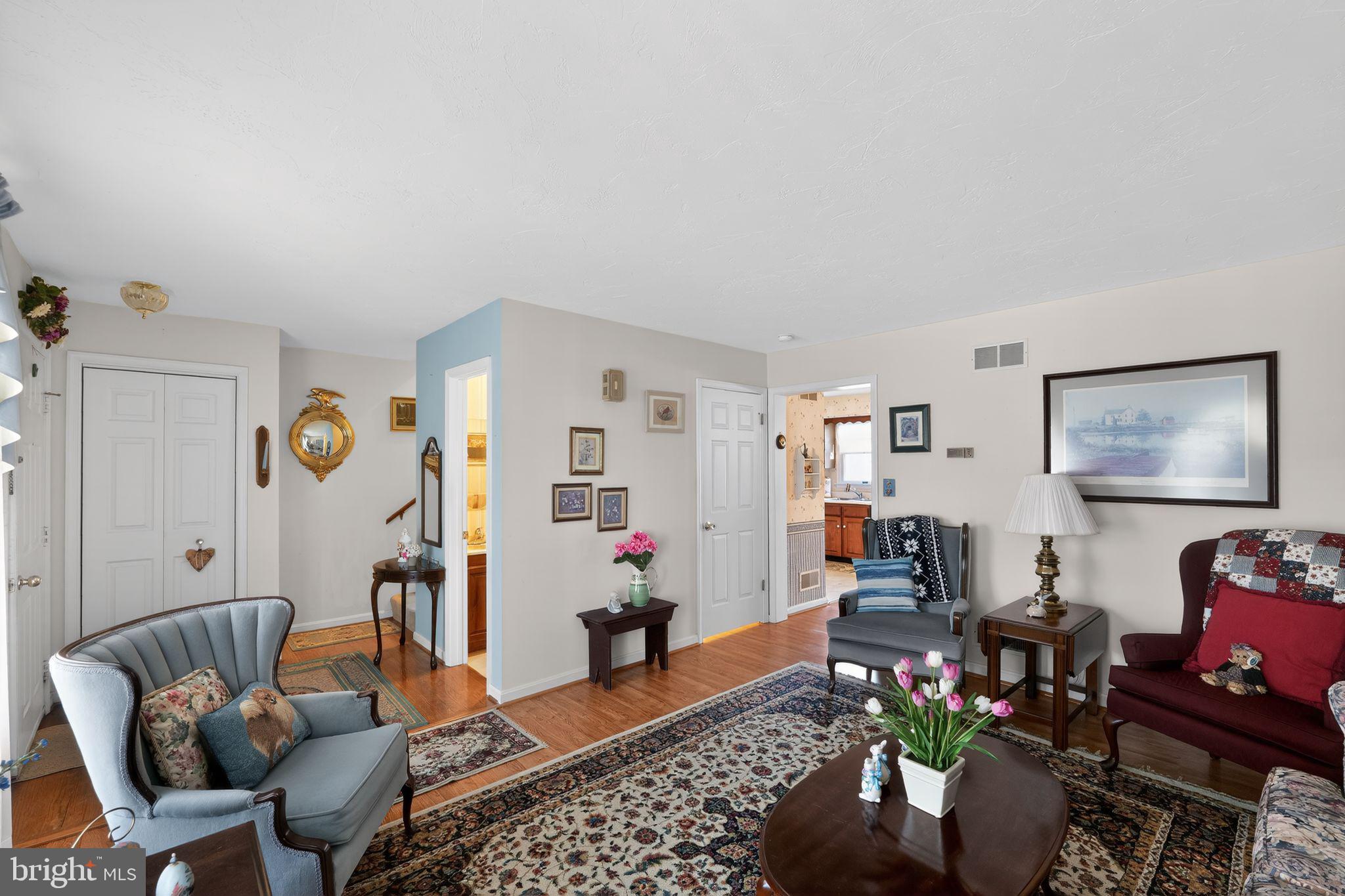 23 Crescent Lane Littlestown, PA 17340 - Photo 7 of 30 a living room with furniture and a rug