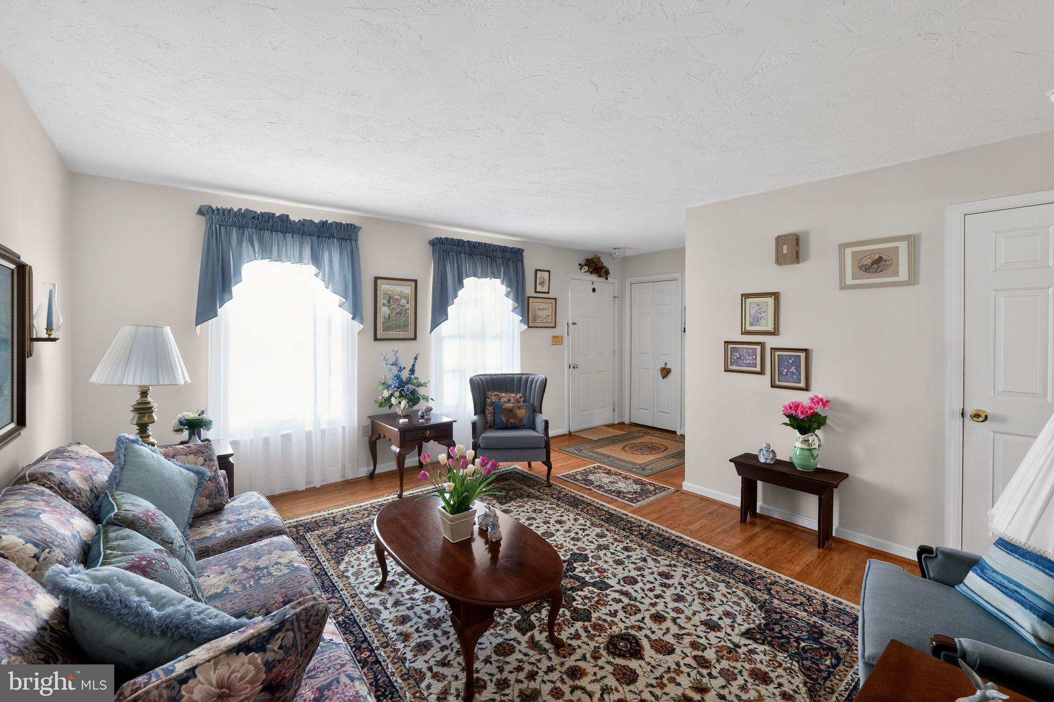 23 Crescent Lane Littlestown, PA 17340 - Photo 10 of 30 a living room with furniture and a wooden floor
