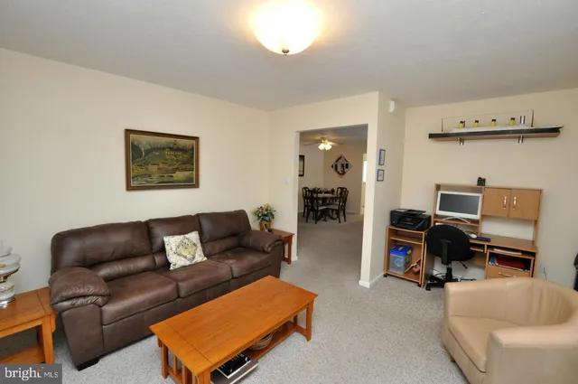 a bedroom with a bed and chair