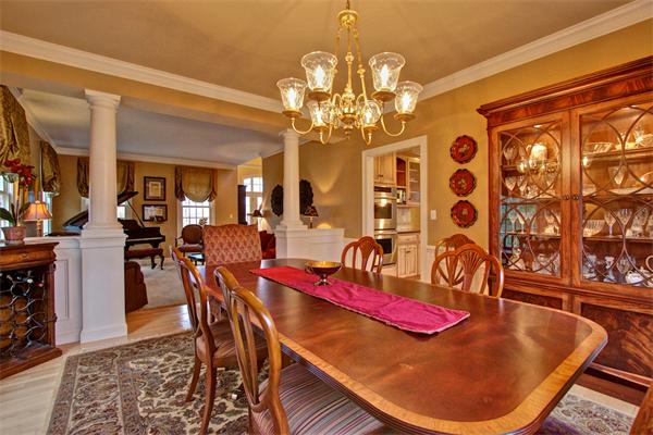 6 Chadwick Way Hopkinton, MA 01748 - Photo 11 of 30 a view of a dining room with furniture a chandelier and wooden floor