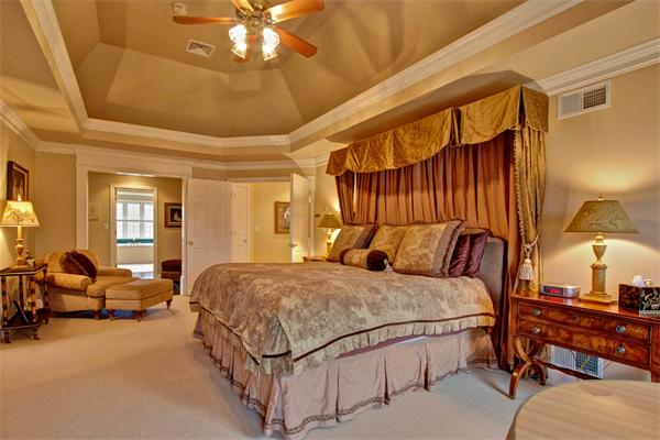 6 Chadwick Way Hopkinton, MA 01748 - Photo 15 of 30 a bedroom with a bed and a chandelier