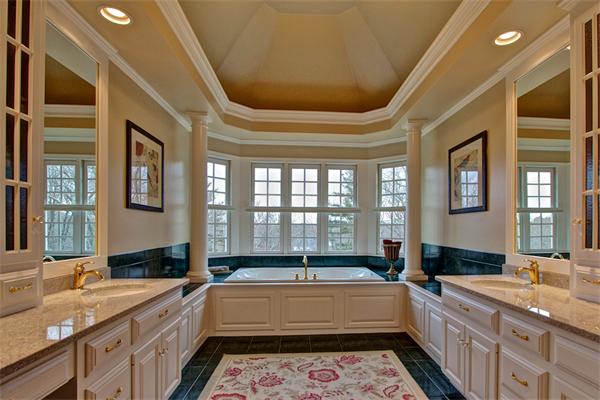 6 Chadwick Way Hopkinton, MA 01748 - Photo 16 of 30 a spacious bathroom with a granite countertop tub sink and mirror