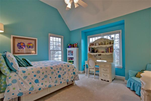 6 Chadwick Way Hopkinton, MA 01748 - Photo 19 of 30 a bedroom with a bed and a chandelier