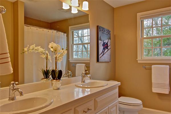 6 Chadwick Way Hopkinton, MA 01748 - Photo 20 of 30 a bathroom with a granite countertop sink mirror vanity and toilet