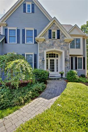 6 Chadwick Way Hopkinton, MA 01748 - Photo 27 of 30 a front view of a house with garden