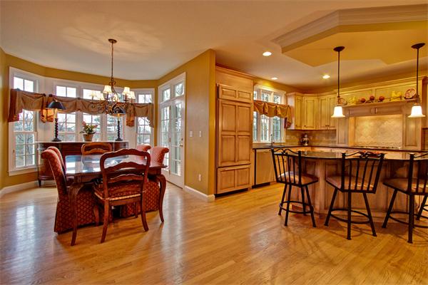 6 Chadwick Way Hopkinton, MA 01748 - Photo 4 of 30 a view of a dining room and livingroom with furniture wooden floor a chandelier