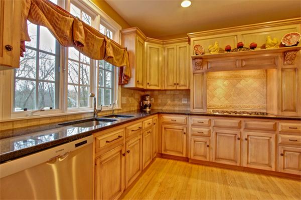 6 Chadwick Way Hopkinton, MA 01748 - Photo 5 of 30 a kitchen with stainless steel appliances granite countertop a stove a sink and a microwave